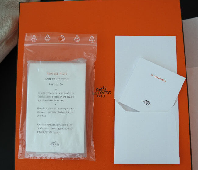 hermes-box-leather-booklet-and-rain-protection