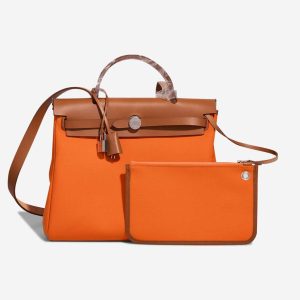 Hermès Herbag  31 Fauve 34, Orange Minium 0X Toile, Vache Hunter 2023 B